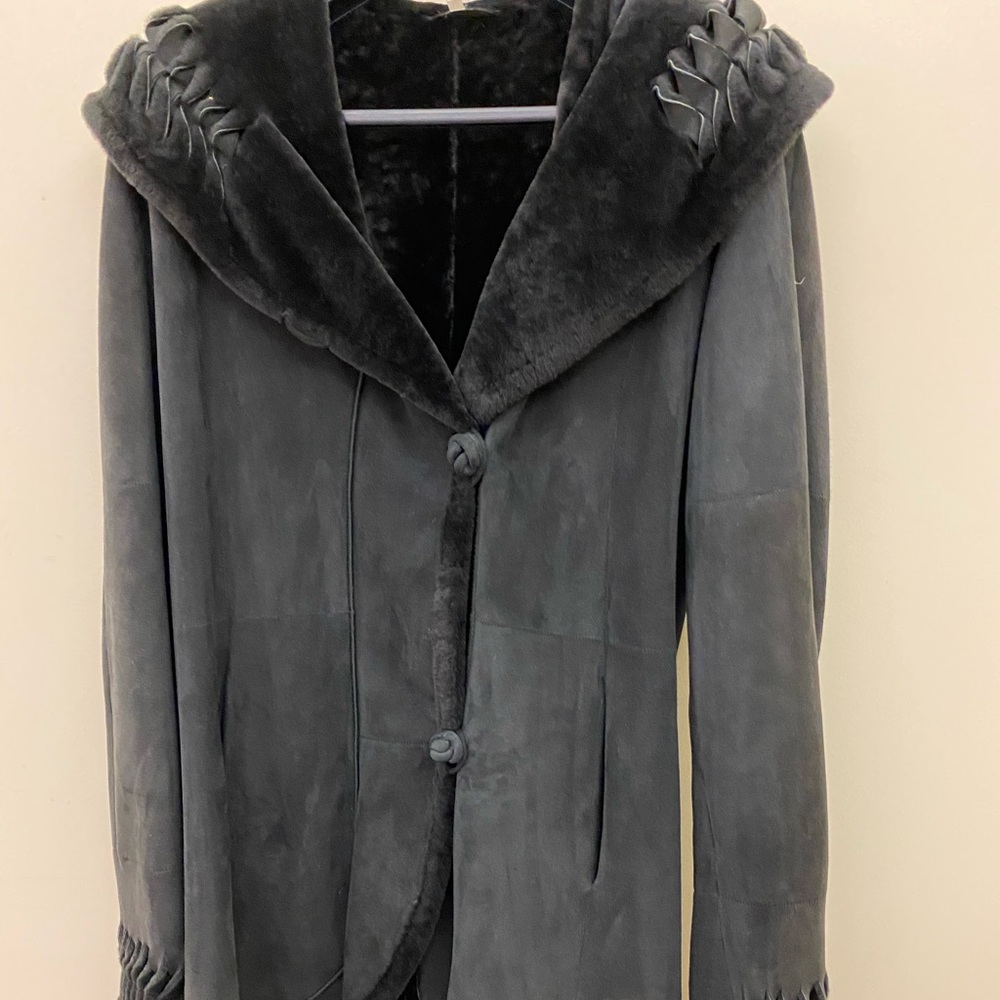 Black shearling 3/4 length coat by Christia